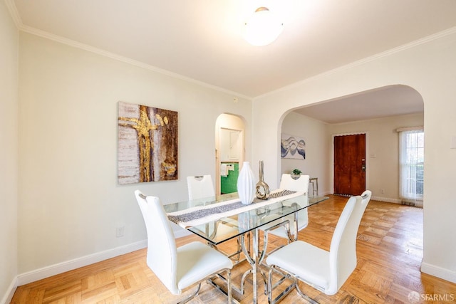 311 Linden Ave, San Bruno, CA 94066 - dining area featuring crown molding, arched walkways, and baseboards