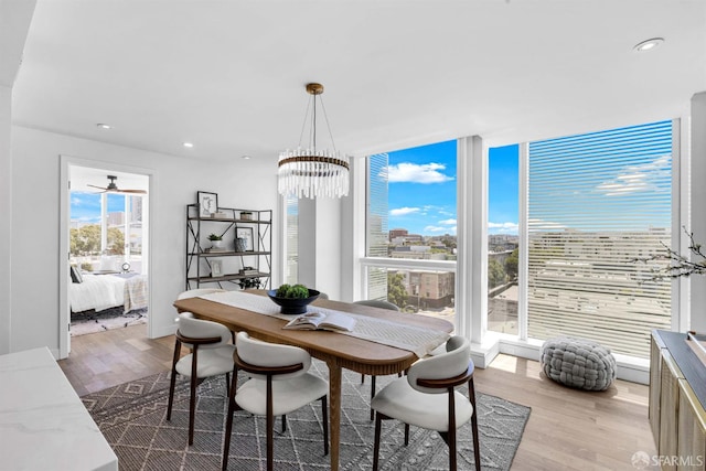 555 Fulton St Unit 519, San Francisco, CA 94102 - dining area with light wood finished floors, recessed lighting, and a chandelier