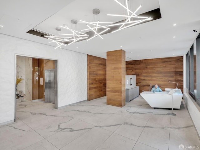 555 Fulton St Unit 519, San Francisco, CA 94102 - living area with wood walls, a chandelier, light marble finish flooring, and recessed lighting