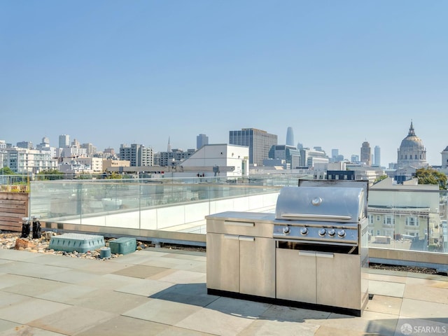 555 Fulton St Unit 519, San Francisco, CA 94102 - view of patio / terrace featuring a skyline view and area for grilling