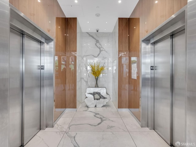 555 Fulton St Unit 519, San Francisco, CA 94102 - corridor featuring elevator and light marble finish floors