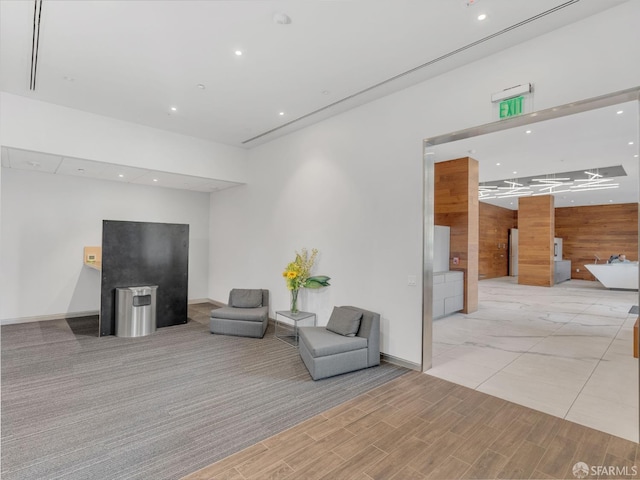555 Fulton St Unit 519, San Francisco, CA 94102 - living area featuring wooden walls, recessed lighting, and baseboards