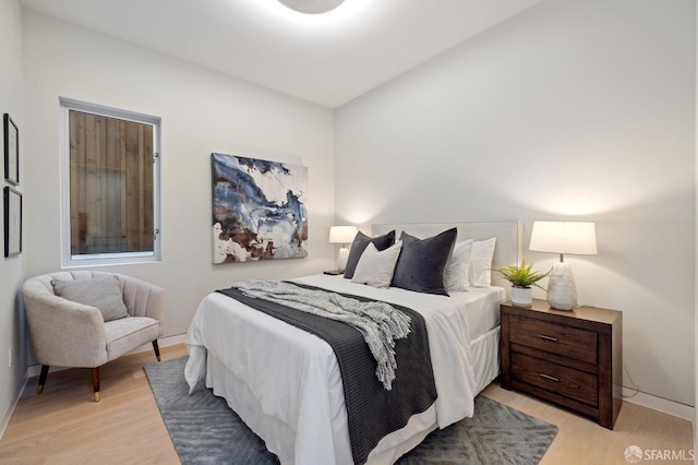 bedroom featuring light hardwood / wood-style flooring