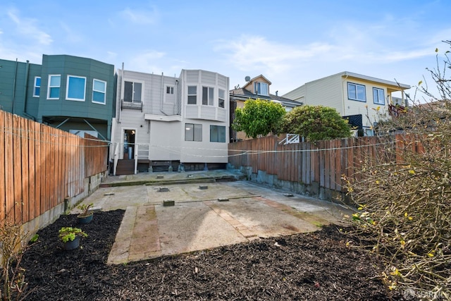 rear view of house with a patio area