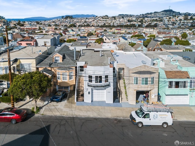 drone / aerial view featuring a mountain view