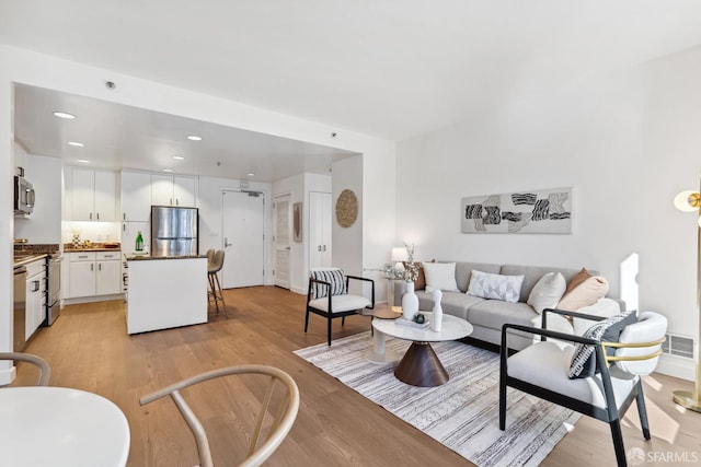 living room featuring light hardwood / wood-style floors