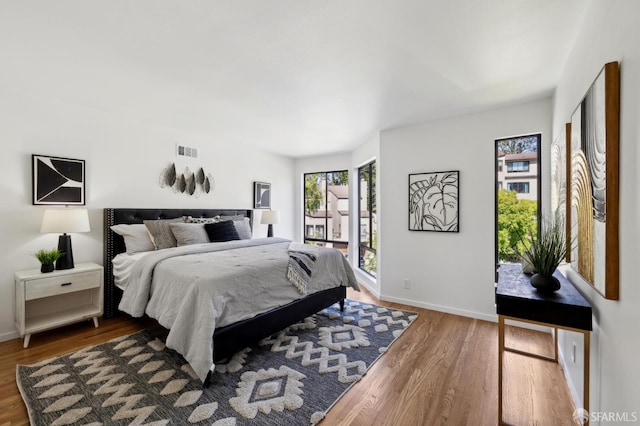 112 S Lake Merced Hls, San Francisco, CA 94132 - bedroom featuring wood finished floors and baseboards