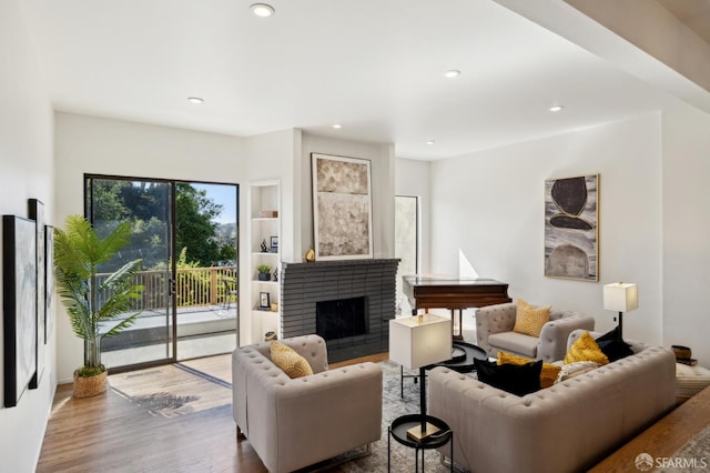 112 S Lake Merced Hls, San Francisco, CA 94132 - living room with wood finished floors, recessed lighting, and a fireplace