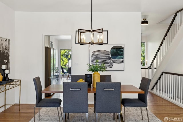112 S Lake Merced Hls, San Francisco, CA 94132 - dining area featuring wood finished floors, stairway, a chandelier, and baseboards