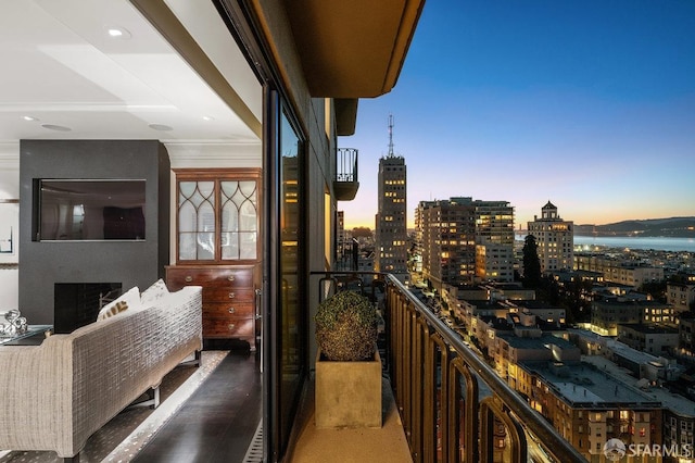 view of balcony at dusk