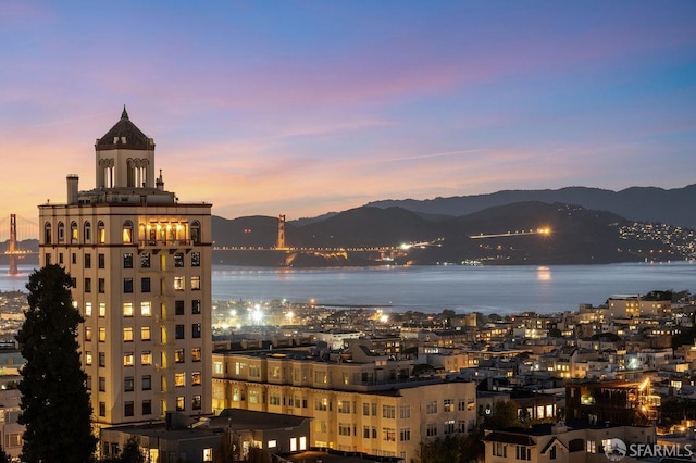 city view featuring a water and mountain view