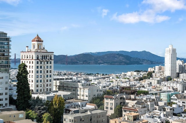 view of city with a water and mountain view