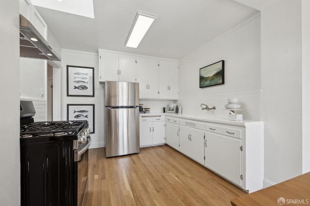 232 Talbert St, San Francisco, CA 94134 - kitchen featuring stainless steel appliances, wall chimney range hood, white cabinetry, light countertops, and crown molding