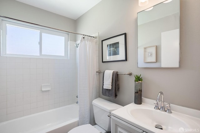 full bathroom featuring shower / tub combo, vanity, and toilet