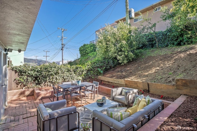 view of patio featuring an outdoor hangout area and outdoor dining space