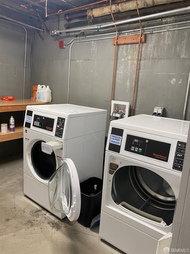 laundry area with washer and clothes dryer