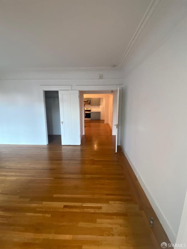 hallway featuring hardwood / wood-style floors