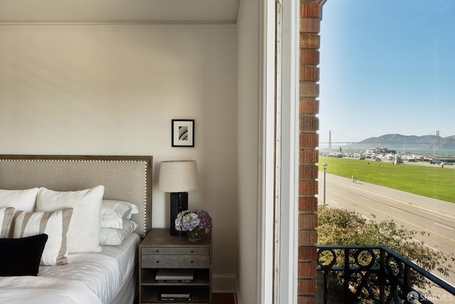 bedroom featuring a mountain view