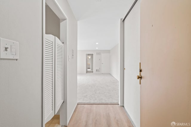 816 N Delaware St Unit 409, San Mateo, CA 94401 - corridor featuring light wood finished floors and light carpet