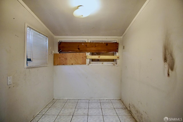 3838 Buell St, Oakland, CA 94619 - spare room featuring ornamental molding and light tile patterned floors