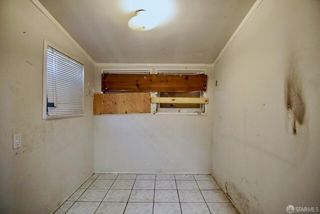 3838 Buell St, Oakland, CA 94619 - spare room featuring ornamental molding and light tile patterned floors