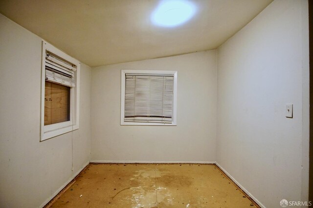 3838 Buell St, Oakland, CA 94619 - empty room featuring baseboards and lofted ceiling