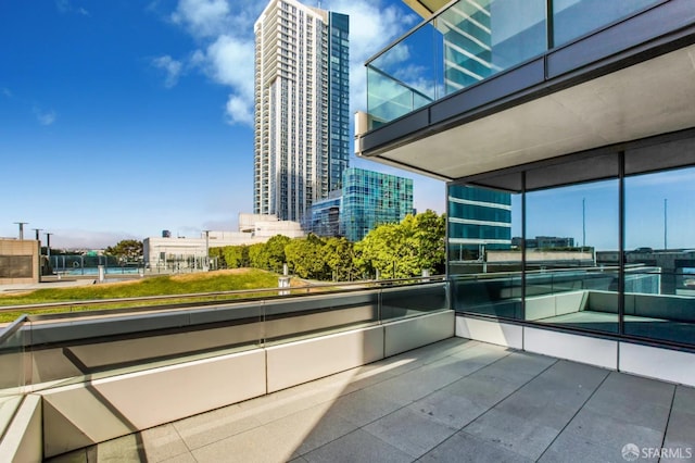 balcony featuring a city view