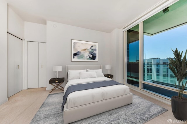 bedroom featuring access to outside and carpet floors