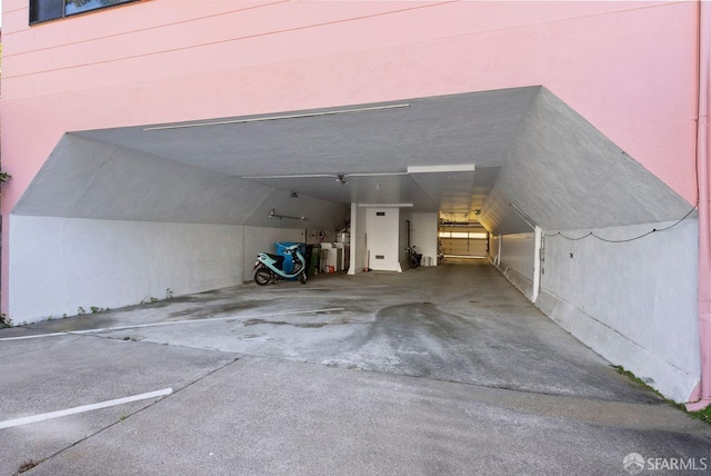 garage featuring a carport