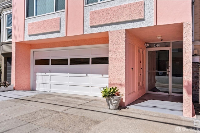 garage with driveway