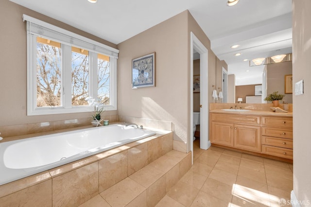 full bath with vanity, a bath, recessed lighting, tile patterned flooring, and toilet