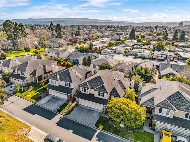 aerial view featuring a residential view and a mountain view