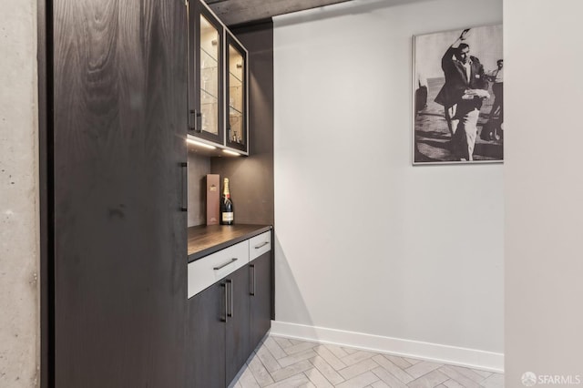 bar featuring light parquet floors