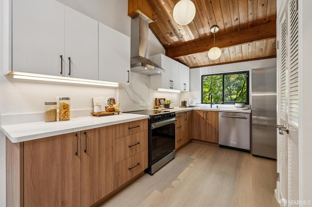 229 Cypress Point Dr, Mountain View, CA 94043 - kitchen with appliances with stainless steel finishes, modern cabinets, light wood finished floors, wall chimney range hood, and light countertops
