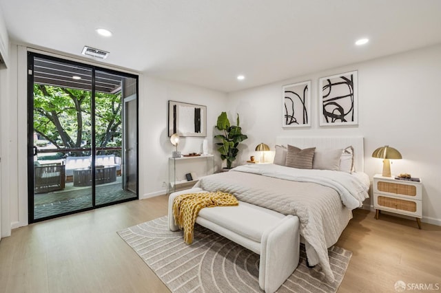 229 Cypress Point Dr, Mountain View, CA 94043 - bedroom featuring access to exterior, recessed lighting, light wood-style flooring, and expansive windows