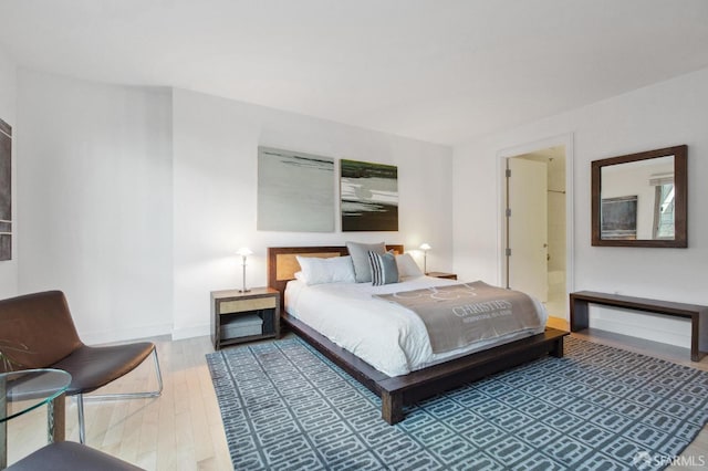 bedroom featuring hardwood / wood-style flooring