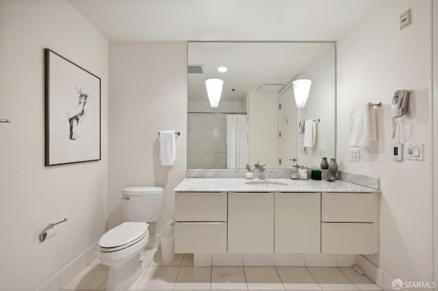 bathroom featuring tile patterned floors, walk in shower, vanity, and toilet