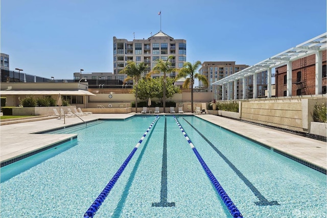 view of swimming pool featuring a patio