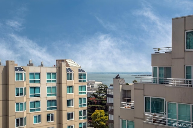 view of building exterior featuring a water view