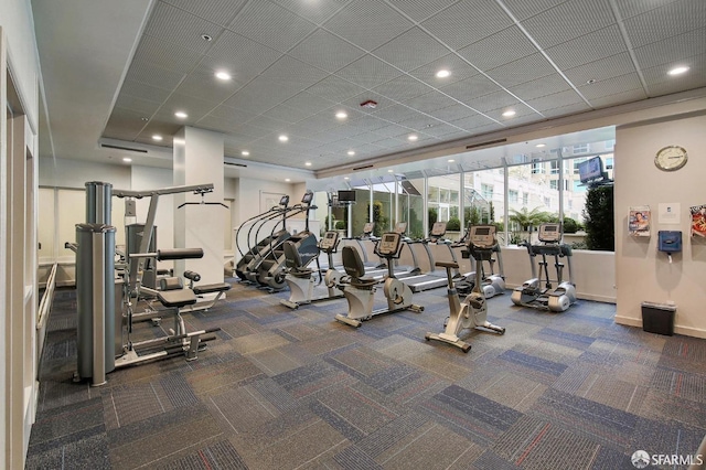 gym featuring dark colored carpet