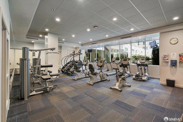 workout area with carpet floors and recessed lighting