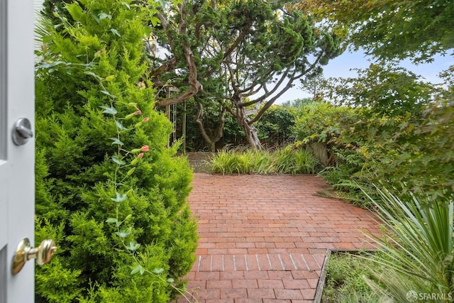 view of patio featuring fence