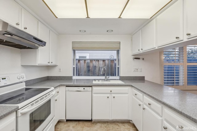 kitchen with under cabinet range hood, white cabinets, white appliances, and a sink