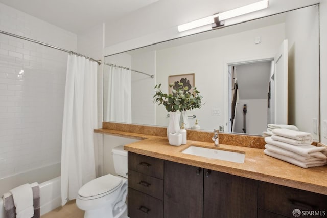 full bath featuring vanity, toilet, and shower / bath combination with curtain
