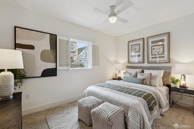 bedroom featuring baseboards, carpet, and a ceiling fan