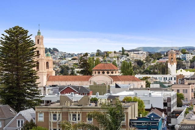 exterior space featuring a residential view and a mountain view
