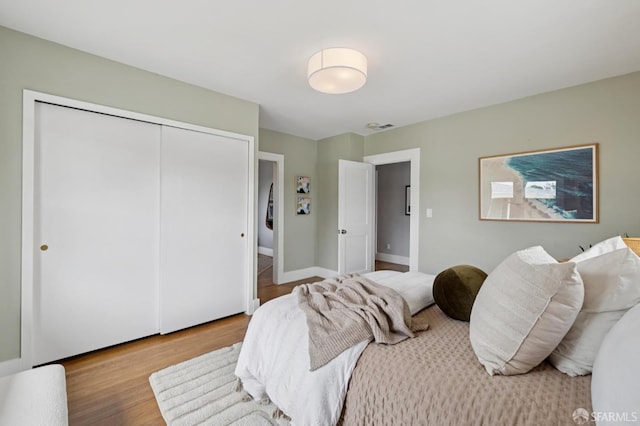 4145 Emerald St, Oakland, CA 94609 - bedroom with a closet and wood finished floors