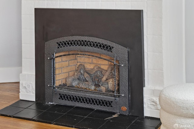 4145 Emerald St, Oakland, CA 94609 - detailed view of wood finished floors and a fireplace