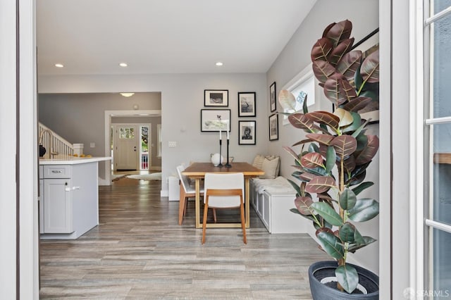 4145 Emerald St, Oakland, CA 94609 - dining room with stairway, light wood-style floors, and recessed lighting