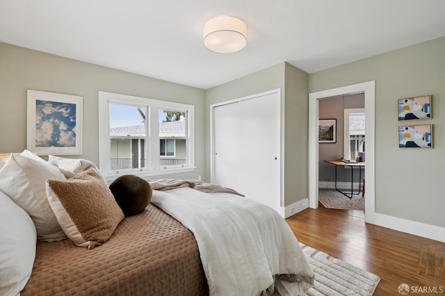 4145 Emerald St, Oakland, CA 94609 - bedroom featuring wood finished floors and a closet